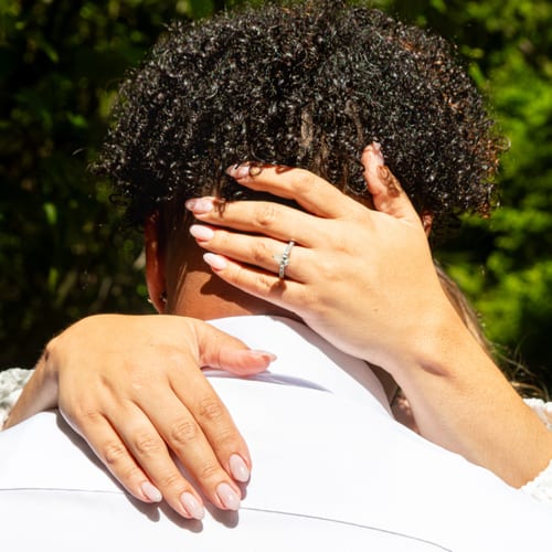 A tender moment between newlyweds